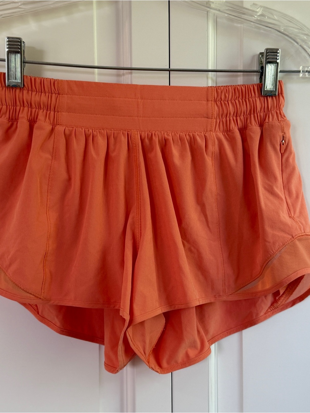 Lululemon size 4 orange low rise 2.5” hotty hot shorts